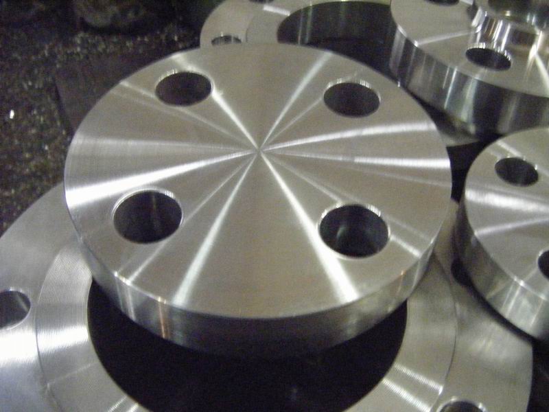 Blind flange is a kind of round plate with no center hole but with all the proper bolt holes.